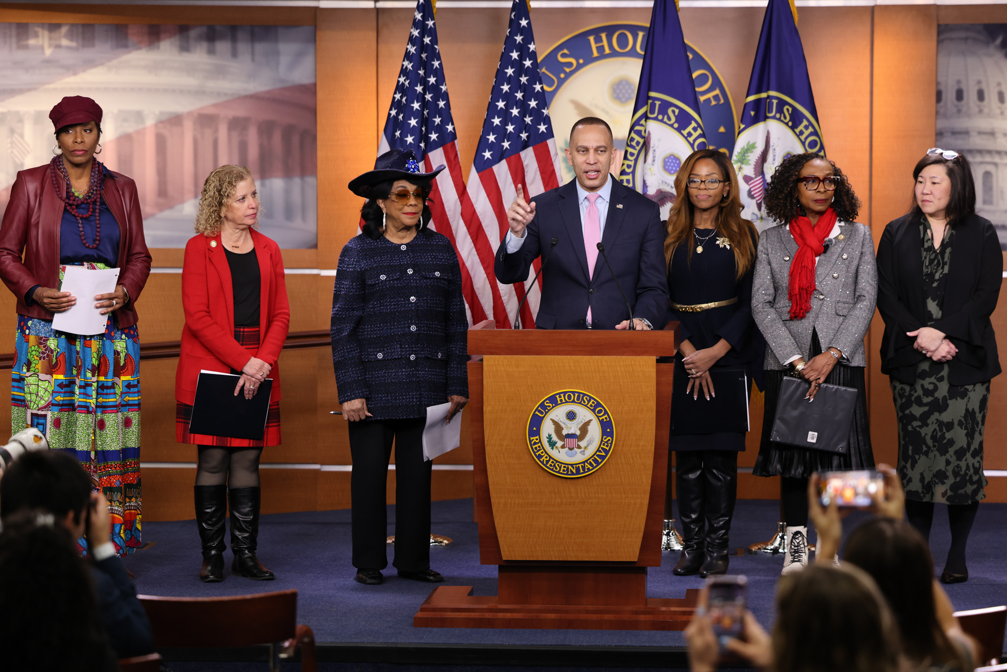 Leader Jeffries (center) Speaking at Press Conference; From left to right, Del. Stacey Plaskett, Rep. Debbie Wasserman Schultz, Rep. Frederica Wilson, Leader Jeffries, Rep. Sheila Cherfilus-McCormick, Rep. Yvette Clarke, Rep. Grace Meng