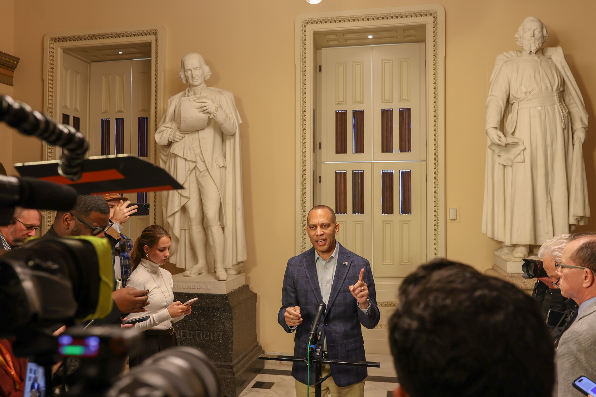 Leader Jeffries holding a press availability at the Will Rogers statue in the US Capitol