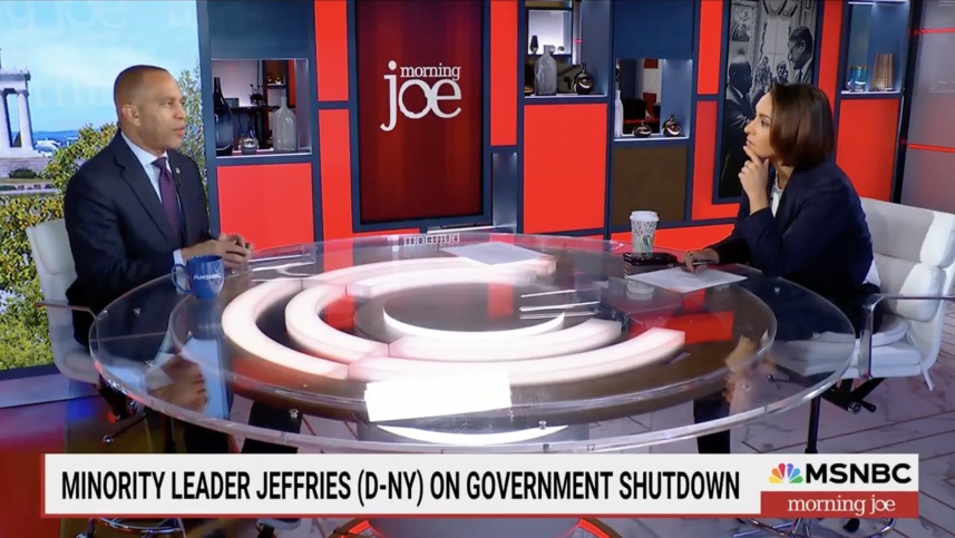Leader Jeffries (left) and Ali Vitali (right) in studio together around a circular table