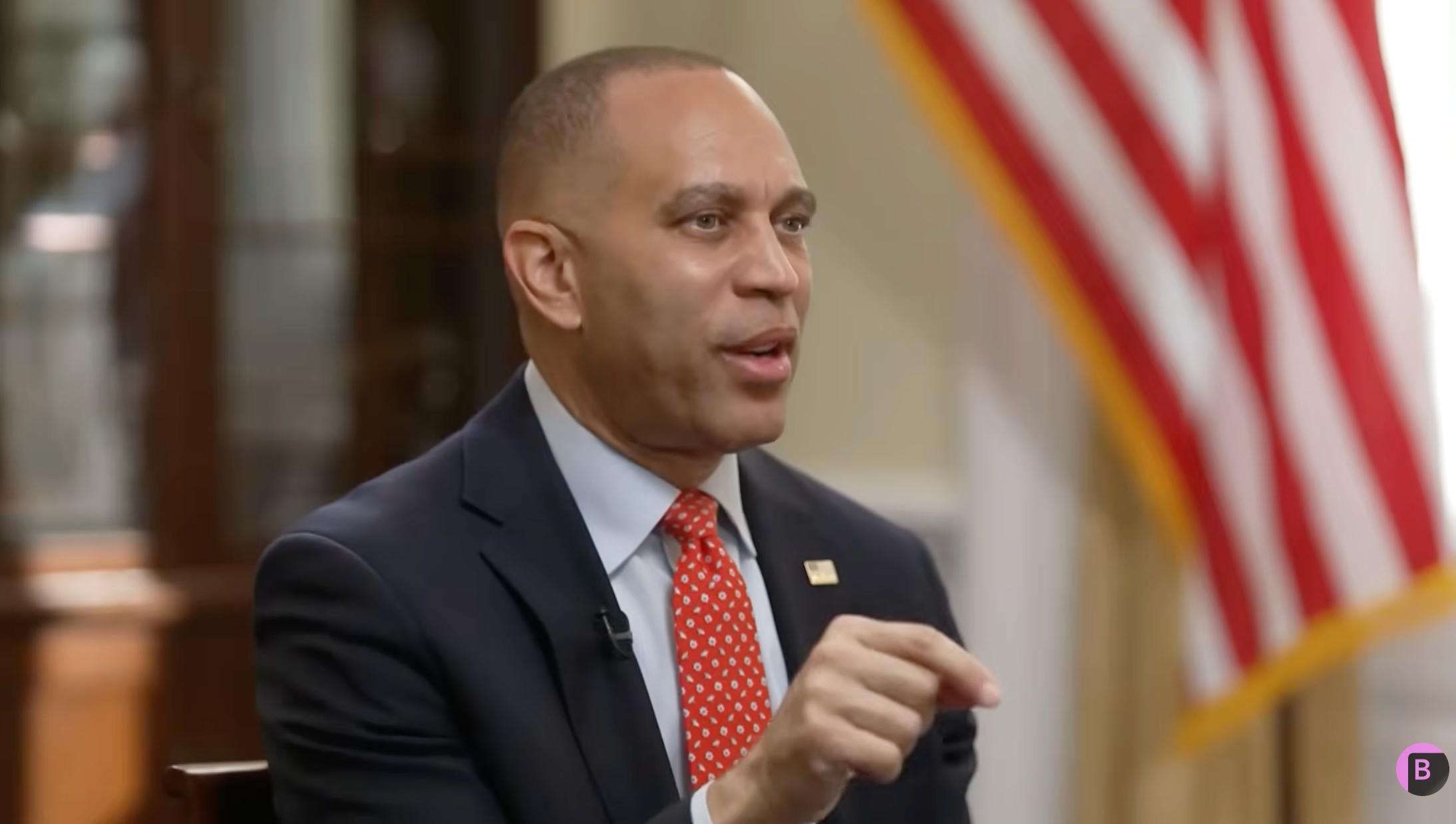 Leader Jeffries appearing on Bloomberg in front of an American flag