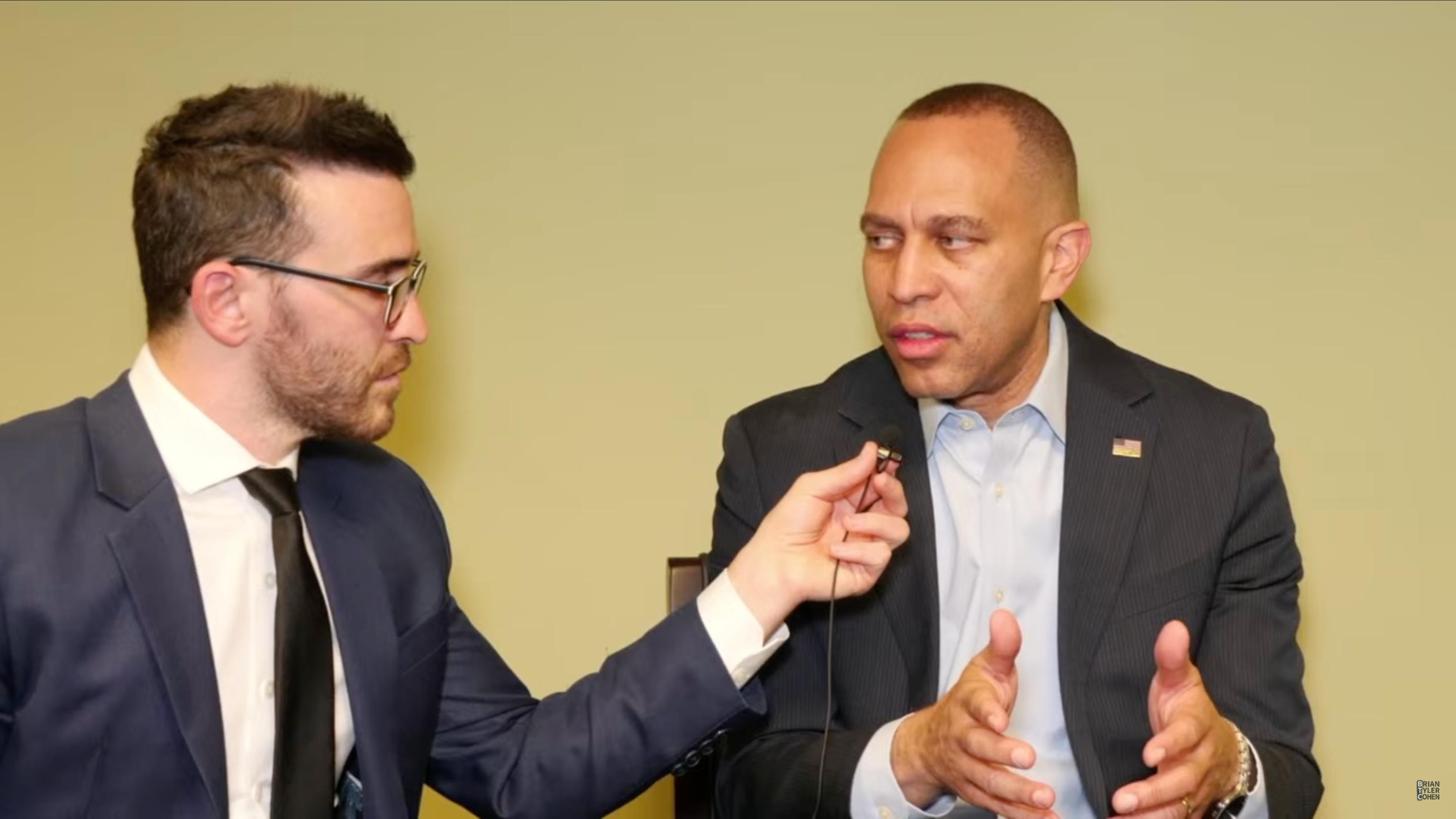 Brian Tyler Cohen (left) and Leader Jeffries (right) appearing on screen