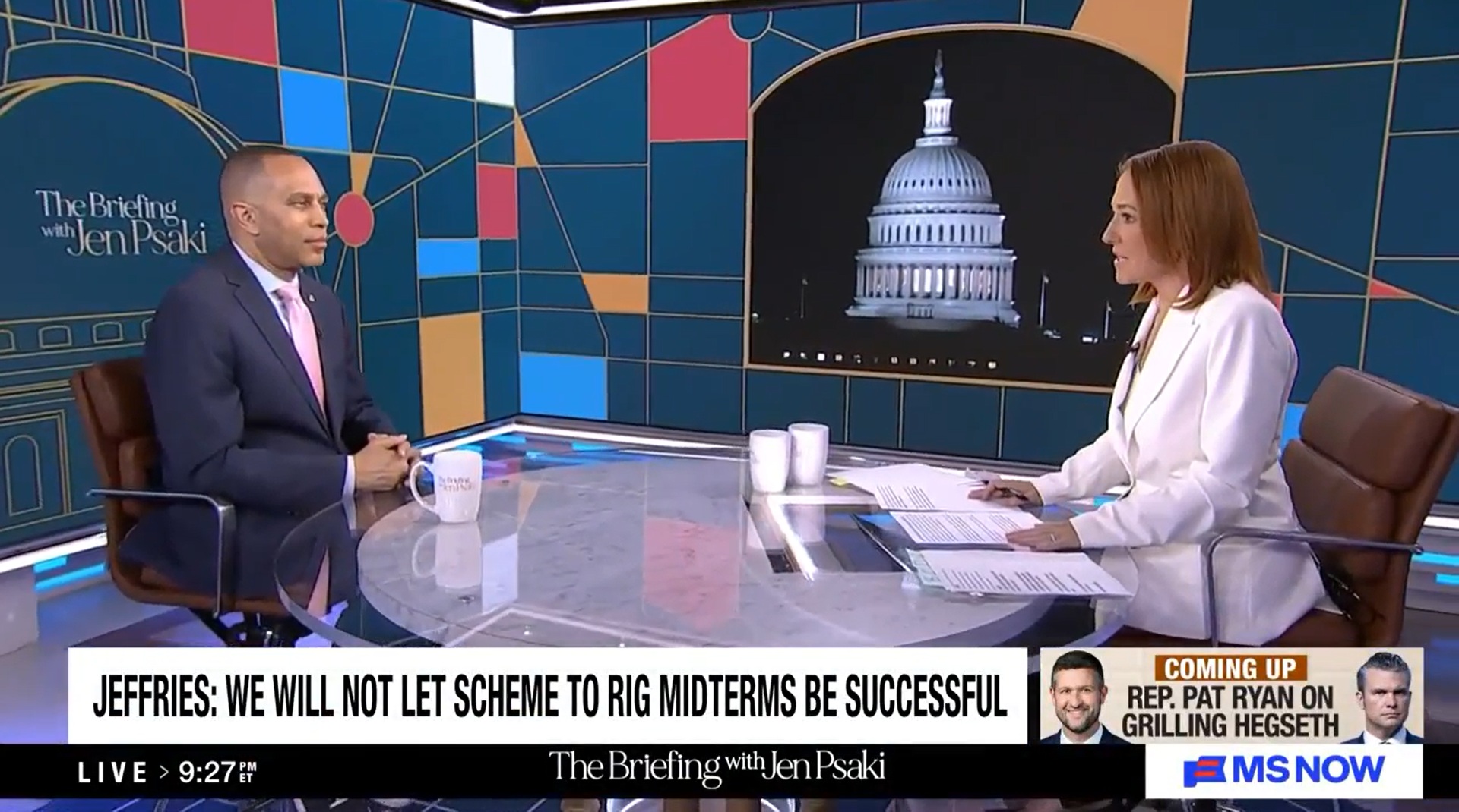 Leader Jeffries (left) and Jen Psaki (right) sitting around a glass table on MS NOW's The Briefing with Jen Psaki