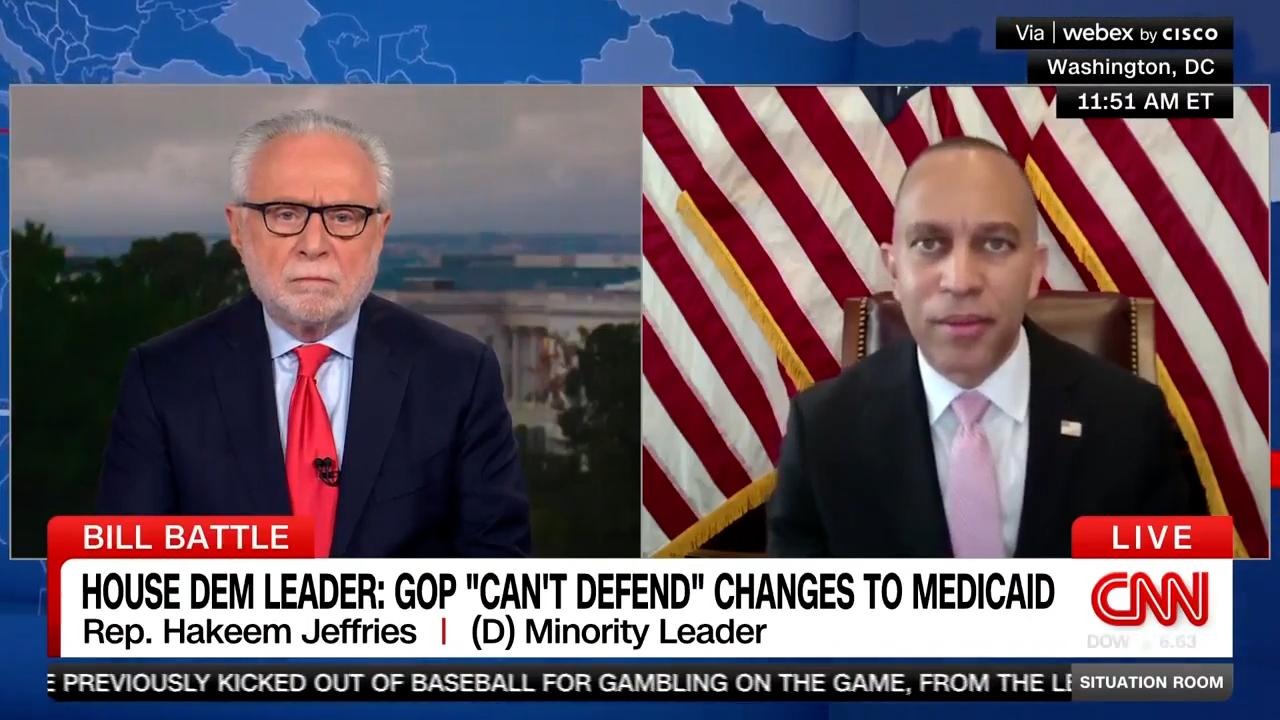 Wolf Blitzer (left) and Leader Jeffries (right) appearing on screen