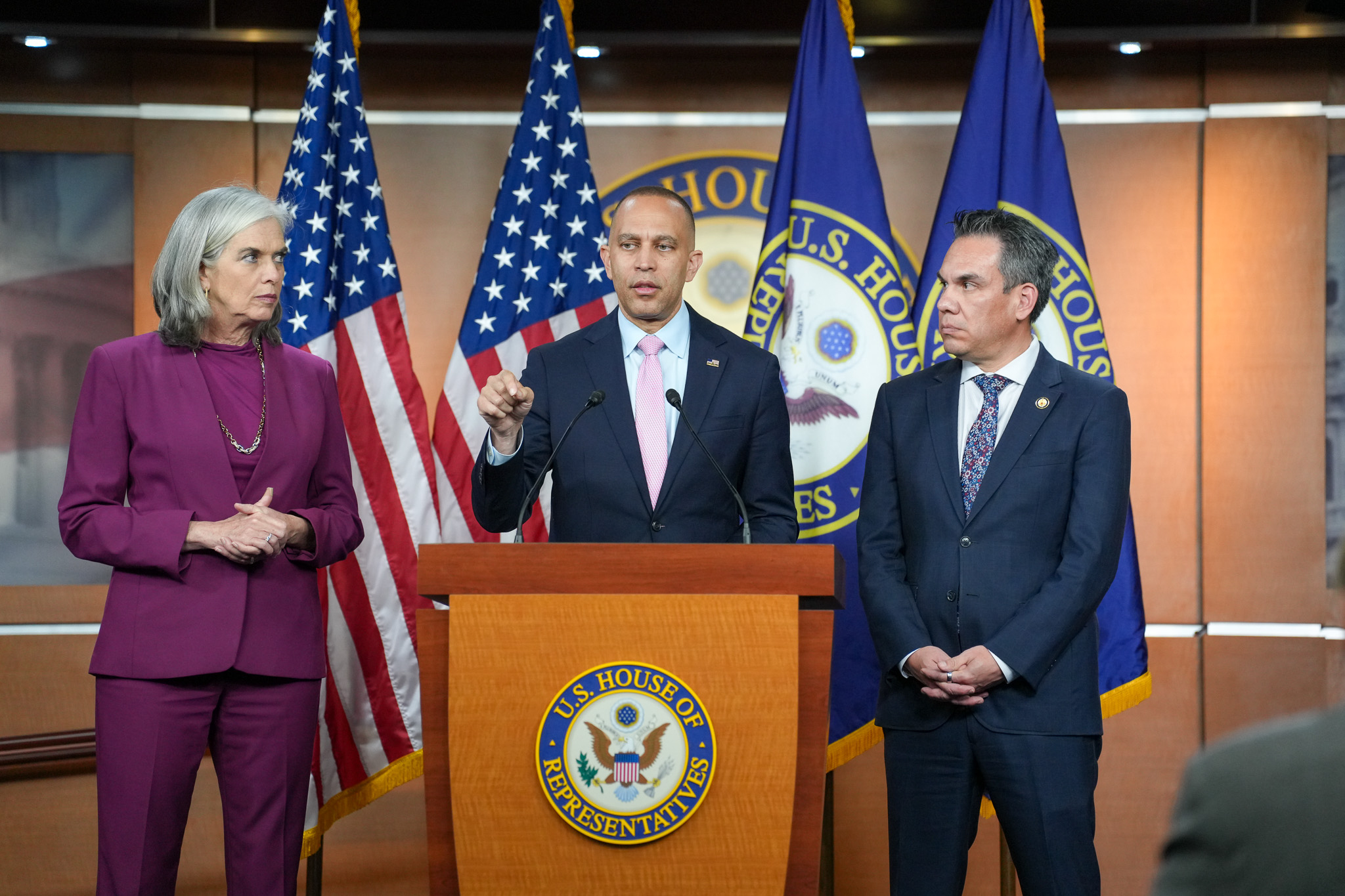 Leader Jeffries (center), Whip Katherine Clark (left) and Chair Pete Aguilar (right) at press conference