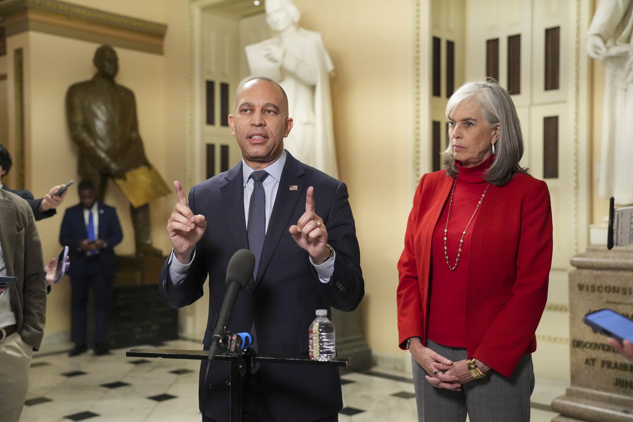 Leader Jeffries (left) and Whip Katherine Clark (right) speaking at Will Rogers press availability