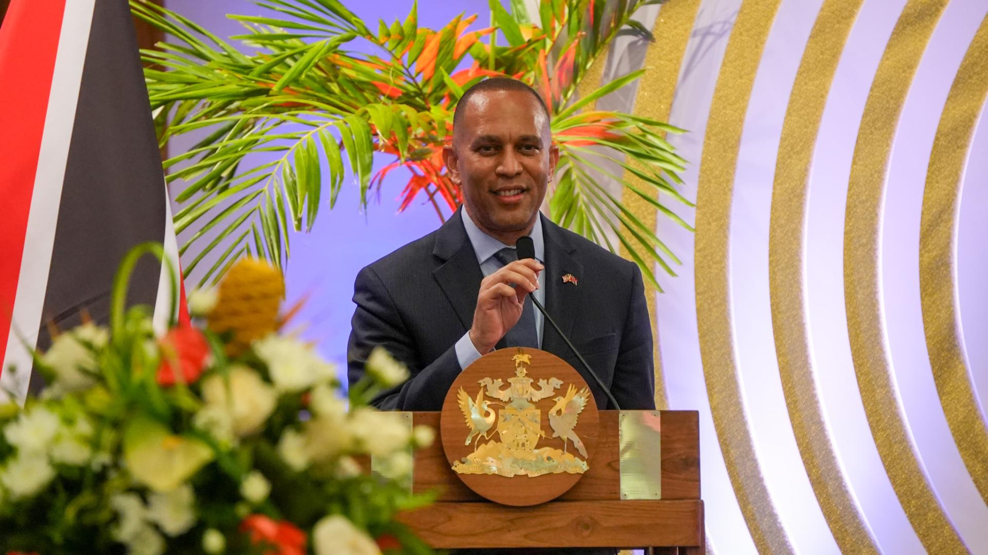 Standing at a podium