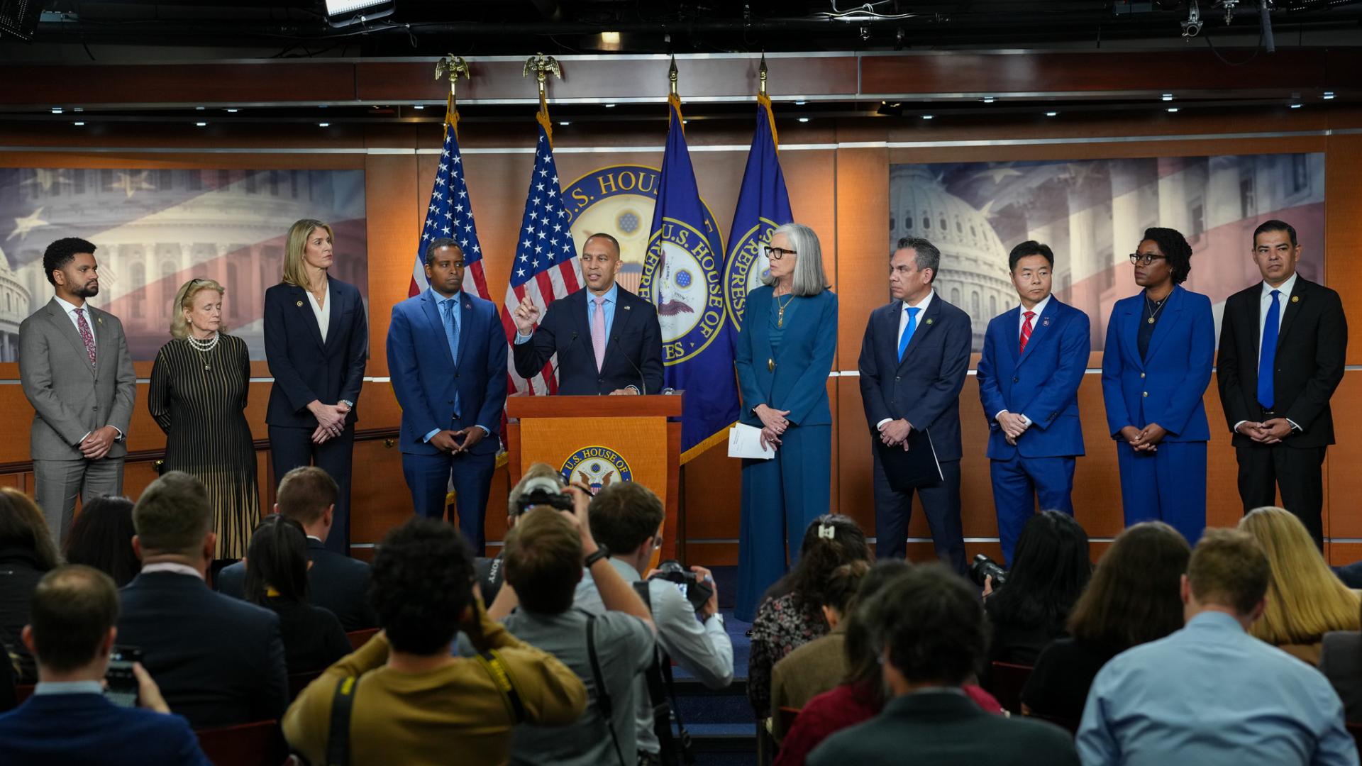 From left to right, DPCC Co-Chair Maxwell Frost, DPCC Chair Debbie Dingell, DPCC Co-Chair Lori Trahan, Assistant Democratic Leader Joe Neguse, Democratic Leader Hakeem Jeffries, Democratic Whip Katherine Clark, Caucus Chair Pete Aguilar, Vice Chair Ted Lieu, DPCC Co-Chair Lauren Underwood, Caucus Leadership Representative Robert Garcia appearing in Studio A for a press conference