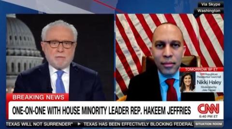 Wolf Blitzer (left) and Leader Jeffries (right) appearing on screen