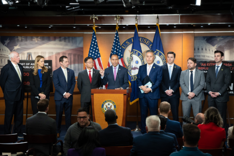 Leader Jeffries speaking at weekly press conference flanked by military veterans from the House Democratic Caucus
