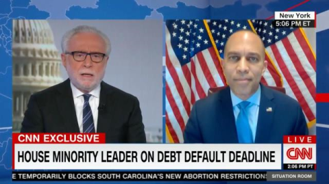 Leader Jeffries (right) and Wolf Blitzer (left) appearing on screen together
