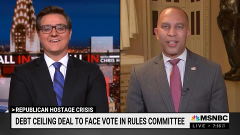 Leader Jeffries (right) and Chris Hayes (left) appearing on screen