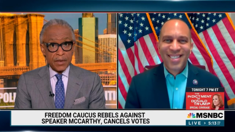 Leader Jeffries (right) and Rev. Al Sharpton (left) appearing on screen