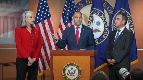 Leader Jeffries (center), Whip Katherine Clark (left) and Chair Pete Aguilar at press conference