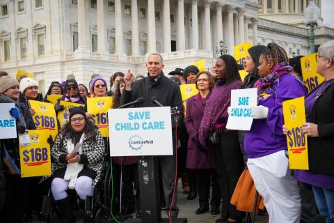Leader Jeffries speaking, flanked by advocates from SEIU and Care Can't Wait Action