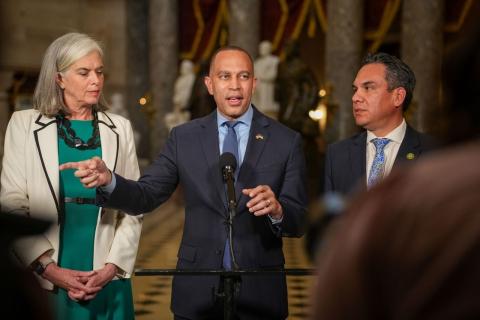 Leader Jeffries (center), Whip Katherine Clark (left) and Chair Pete Aguilar at press availability in Statuary Hall